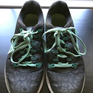 Mint green and black nike sneakers